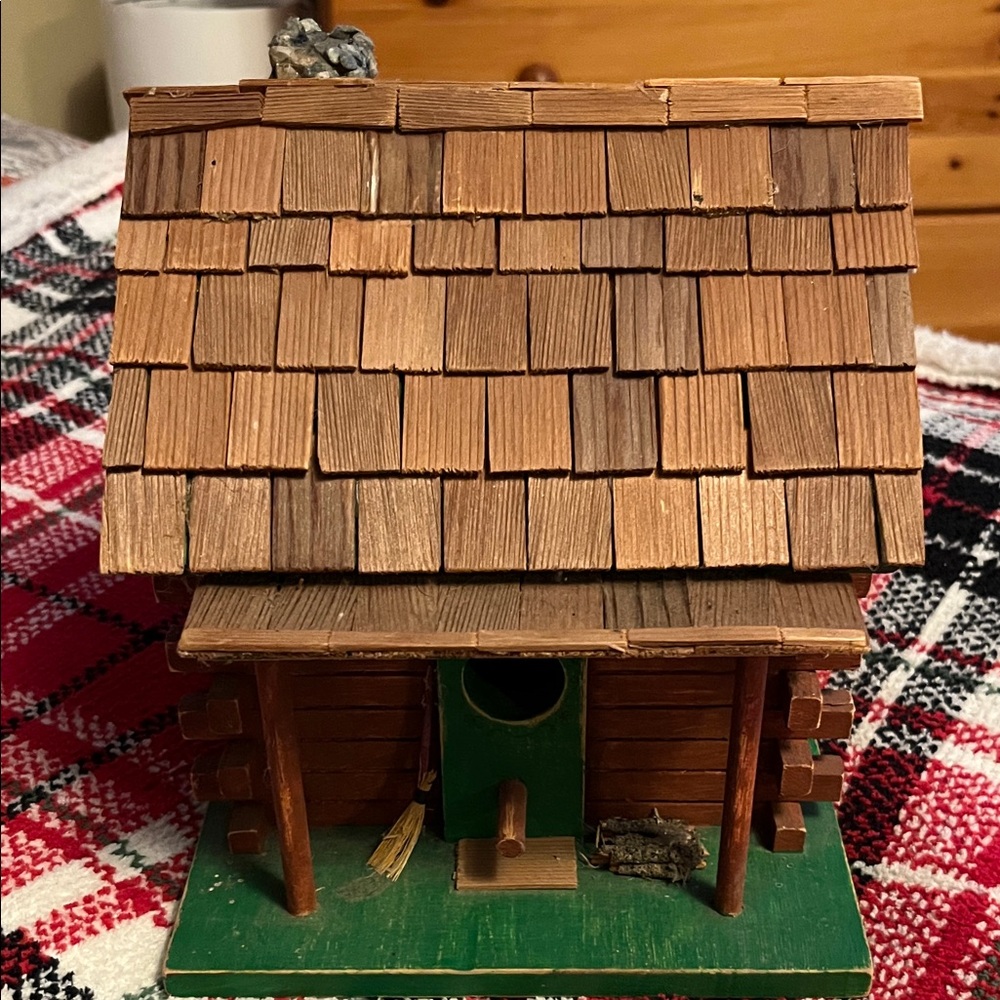 Rustic Wooden Birdhouse with Green Base